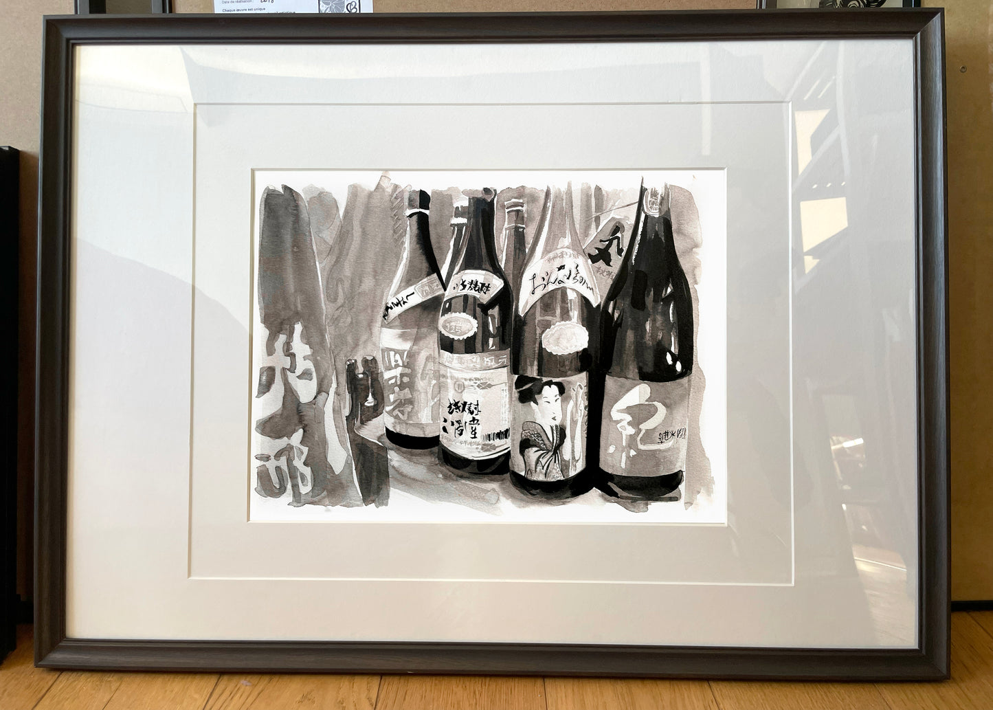 Bouteilles de saké avec Maiko