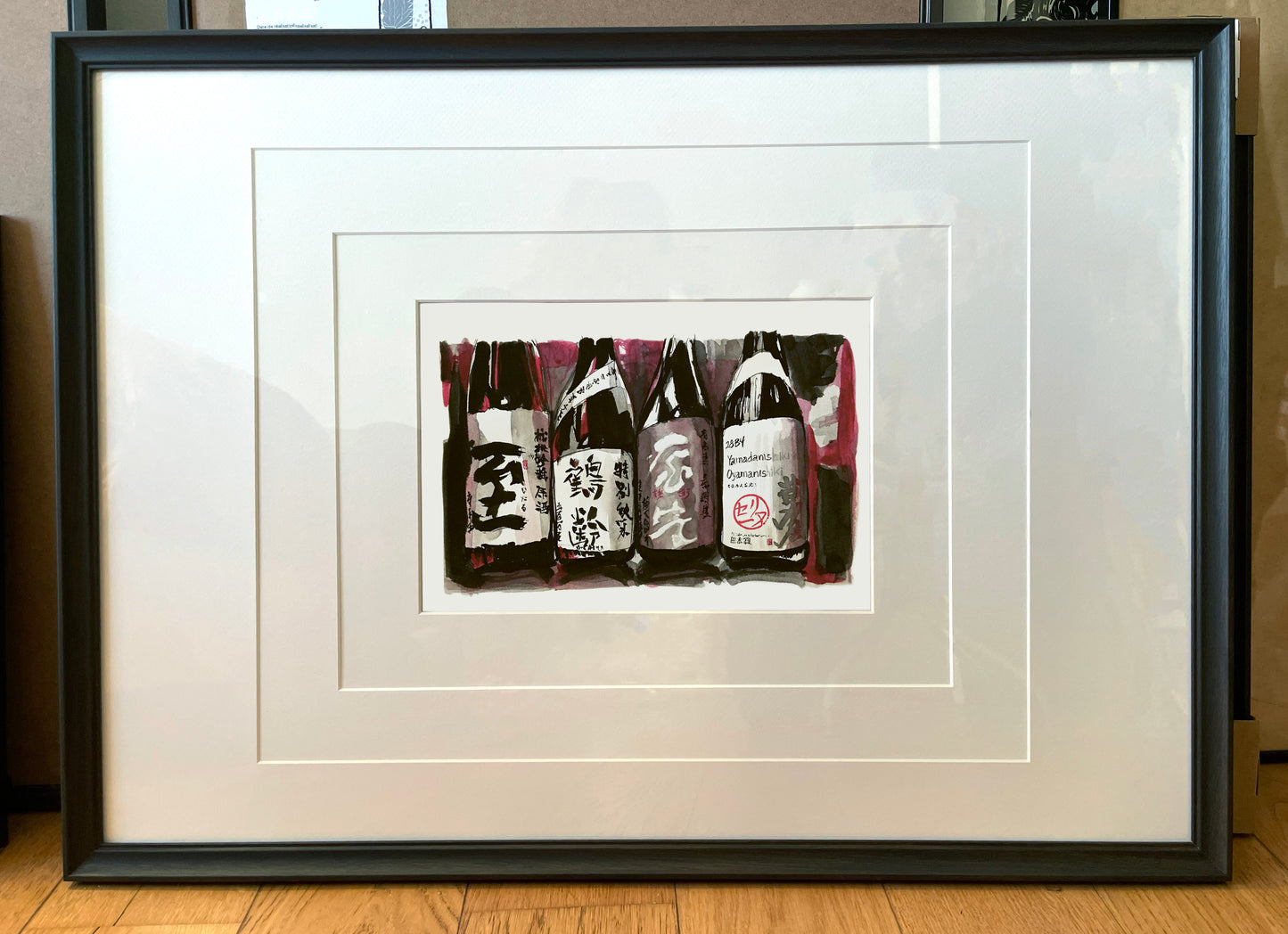 Bouteilles de saké encadrement